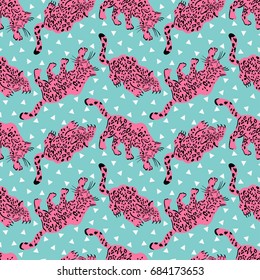 Vector seamless pattern with funny jaguars in memphis style for textile
