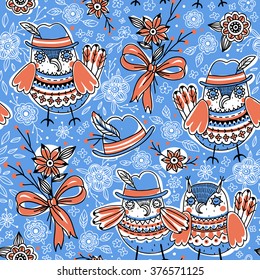 vector  seamless pattern with funny owls on a blue background