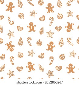 Vector seamless pattern with gingerbread cookies. Cute design for Christmas wrappings, textile, wallpaper and backgrounds.