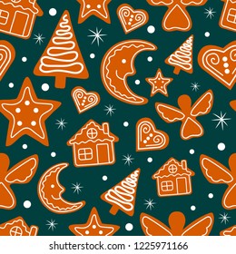 Vector seamless pattern with gingerbreads on emerald background