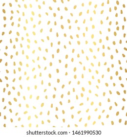 Vector seamless pattern with gold painted dots. Shiny confetti background.