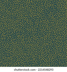 Vector seamless pattern with gold polka dots on green background. Modern simple  background with polka dots. For the design of textiles, wrapping paper, wallpaper.