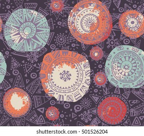 Vector seamless pattern with graphic doodle suns, stars and tribal elements. Hand drawn endless colorful background with many details and elements and watercolor texture. Modern fashion textile design