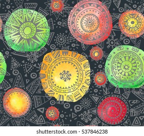 Vector seamless pattern with graphic doodle suns, stars and tribal elements. Hand drawn endless background with bright colors with many details and elements and watercolor texture. 