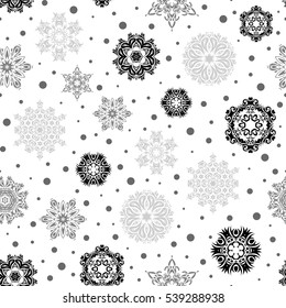 Vector seamless pattern in gray and black colors on white background. Snowflakes winter New Year frame.