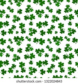 Vector seamless pattern of green clovers on white background. Greeting, banners, posters background for St. Patrick's Day