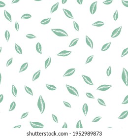 Vector seamless pattern with green hand drawn simple leaves on white background