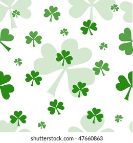 Vector seamless pattern with green shamrocks on white background