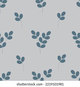 Vector seamless pattern with grey eucalyptus branches in blue background