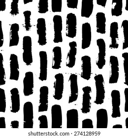 Vector seamless pattern with grunge calligraphic brush strokes. Monochrome tribal concept. Scandinavian style. Good for cards, posters, textile print, surface texture, web page background, wallpaper.