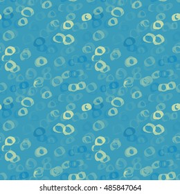 Vector seamless pattern of grunge spots and circles in blue.