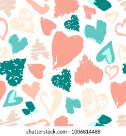 Vector seamless pattern with hand drawn stylish grunge hearts. Pastel light modern colors