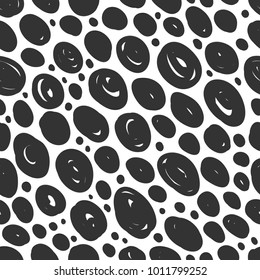 Vector seamless pattern with hand drawn polka dots black colour on white background. Good for wrapping paper, wallpaper design, greeting cards, web page banners, interior surface, fabric print design