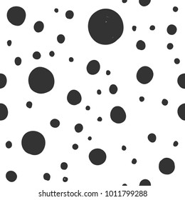 Vector seamless pattern with hand drawn polka dots black colour on white background. Good for wrapping paper, wallpaper design, greeting cards, web page banners, interior surface, fabric print design