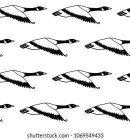 Vector seamless pattern with hand drawn flying wild geese. Beautiful animal design elements, ink drawing.