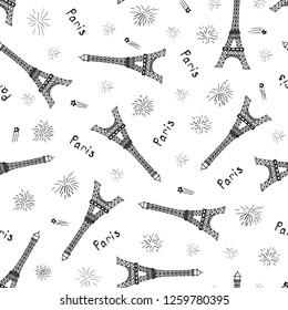 Vector seamless pattern with hand drawn Eiffel towers, fireworks and word Paris.