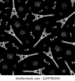 Vector seamless pattern with hand drawn Eiffel towers, fireworks and word Paris.