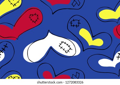 Vector seamless pattern of hand drawn red, yellow, white hearts with black stroke and plaster, scar and patch in doodling style on blue background
