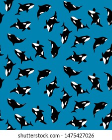Vector seamless pattern of hand drawn killer whale swimming on blue background. Texture with jamb of Orca
