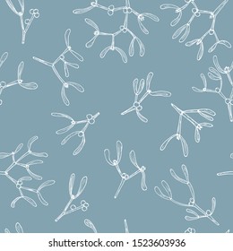 Vector seamless pattern with hand drawn mistletoe twigs and berries on gray background