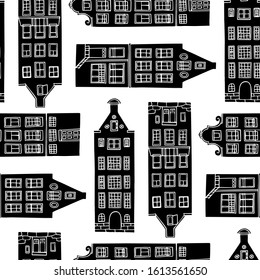 Vector seamless pattern with hand drawn old city houses. Ink drawing, linocut style. Beautiful city and travel design elements, perfect for prints and patterns