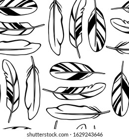 Vector seamless pattern with hand drawn feathers. Beautiful ethnic design elements, ink drawing. Perfect for prints and patterns