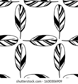 Vector seamless pattern with hand drawn feathers. Beautiful ethnic design elements, ink drawing. Perfect for prints and patterns