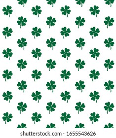 Vector seamless pattern of hand drawn shamrock clover silhouette isolated on white background