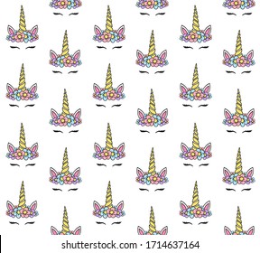 Vector seamless pattern of hand drawn doodle sketch colored unicorn face with flowers isolated on white background