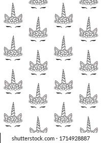 Vector seamless pattern of hand drawn doodle sketch unicorn face with flowers isolated on white background