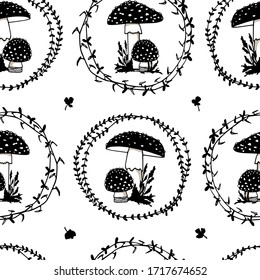 Vector seamless pattern with hand drawn Amanita mushrooms in floral wreath. Beautiful wild forest design elements, black ink drawing. Perfect for prints and patterns.