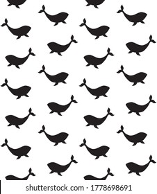 Vector seamless pattern of hand drawn whale silhouette isolated on white background