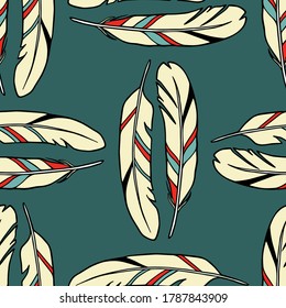 Vector seamless pattern with hand drawn colorful feathers. Beautiful ethnic design elements, ink drawing. Perfect for prints and patterns
