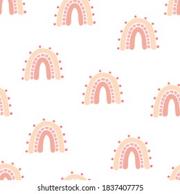 Vector seamless pattern with hand drawn cute rainbows. Simple design for child textile, decoration, wallpaper