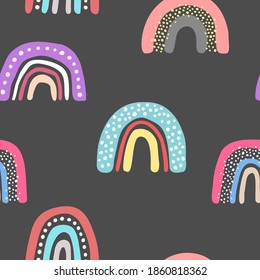 Vector seamless pattern with hand drawn cute rainbows. Simple design for child textile, decoration, wallpaper, stationery.