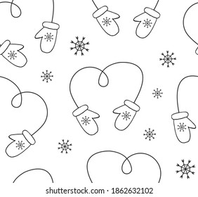 Vector seamless pattern of hand drawn doodle sketch mittens isolated on white background