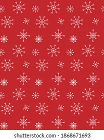 Vector seamless pattern of hand drawn doodle sketch white snowflakes isolated on red background