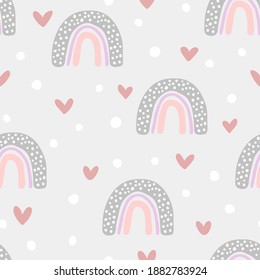 Vector seamless pattern with hand drawn cute rainbows. Simple design for child textile, decoration, wallpaper, stationery.