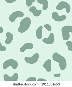 Vector seamless pattern of hand drawn leopard green dotted fur print isolated on white background