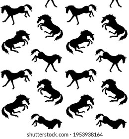 Vector seamless pattern of hand drawn kicking horse silhouette isolated on white background
