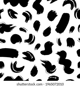 Vector seamless pattern with hand drawn abstract ink brush strokes. Illustration with black stains and smeans on white background for wrapping paper, wallpaper, textile, pillows, clothes.