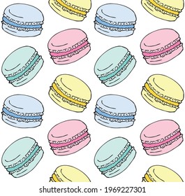 Vector seamless pattern of hand drawn doodle sketch pastel colored macaron pie isolated on white background