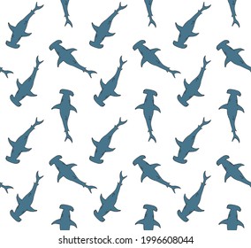 Vector seamless pattern of hand drawn doodle sketch colored hammerhead shark isolated on white background