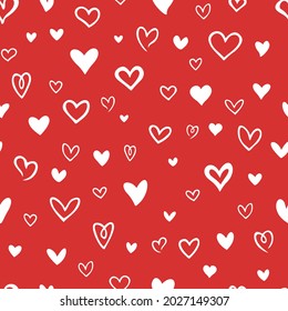 Vector seamless pattern with hand drawn hearts. Cute design for fabric, wrapping, wallpaper for Valentine's Day.