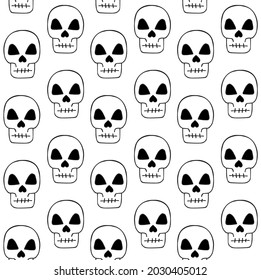 Vector seamless pattern of hand drawn doodle sketch skull isolated on white background