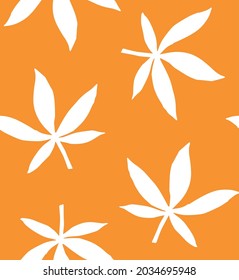 Vector seamless pattern of hand drawn doodle sketch autumn leaves silhouette isolated on orange background