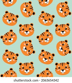 Vector seamless pattern of hand drawn flat tiger face isolated on mint background