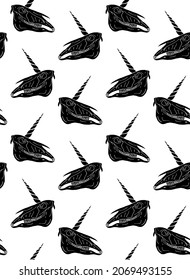 Vector seamless pattern of hand drawn doodle sketch black unicorn skull isolated on white background