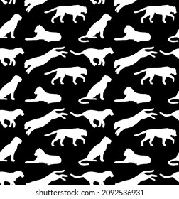 Vector seamless pattern of hand drawn tigers silhouette isolated on black background