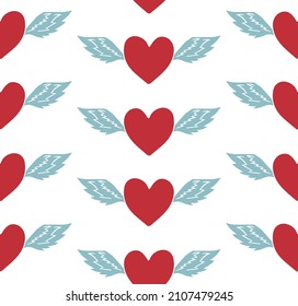 Vector seamless pattern of hand drawn doodle sketch colored heart with wings isolated on white background